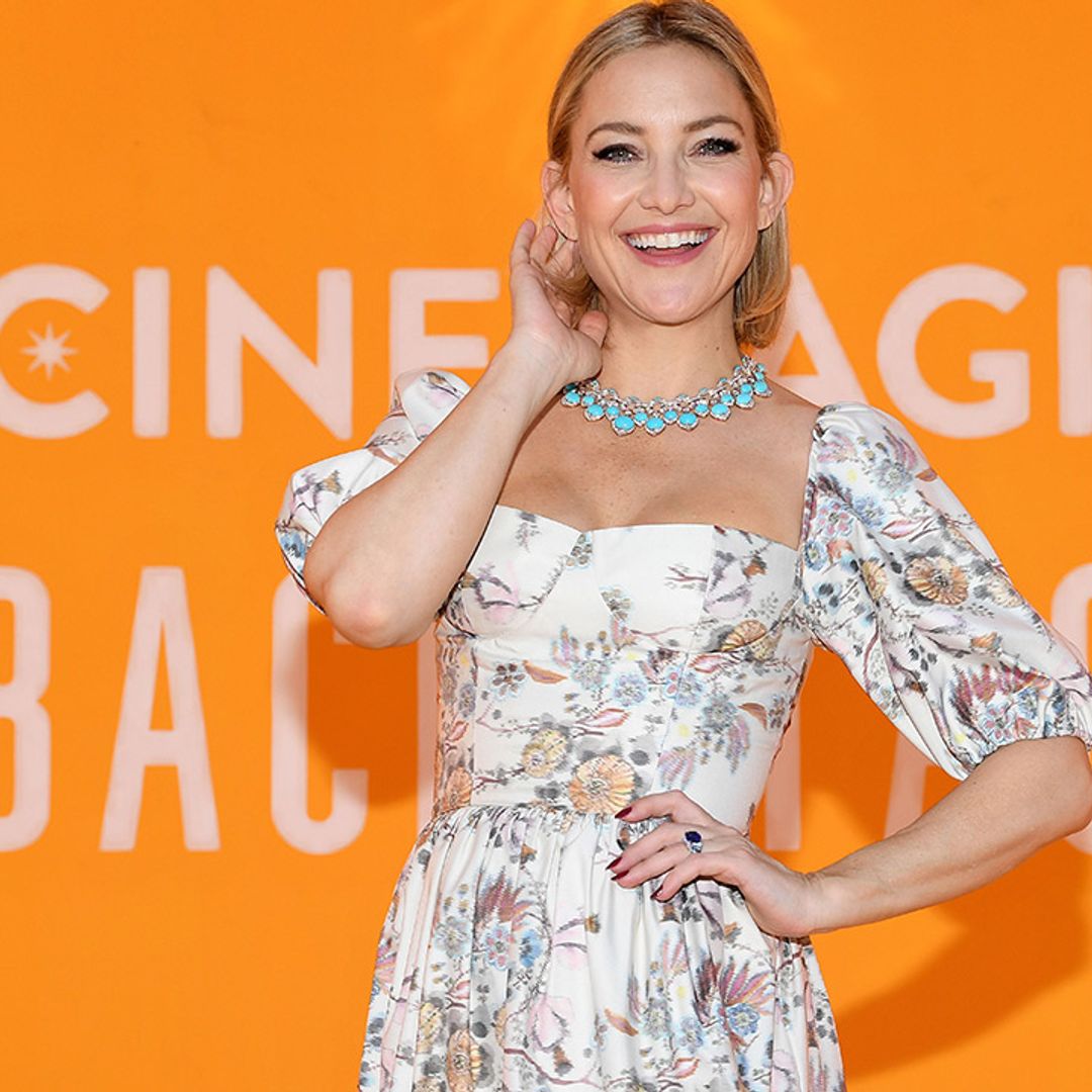 Kate Hudson is a vision in blue in gorgeous flowing dress