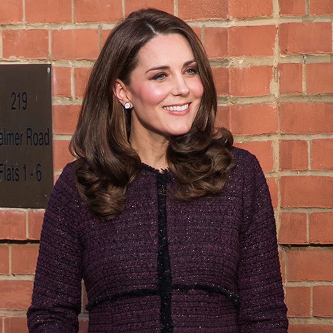 Kate hands out presents at children's Christmas party