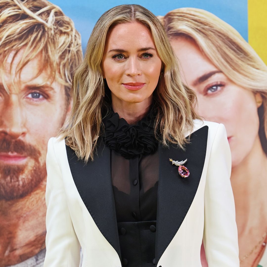 Emily Blunt's sheer shirt and white power suit is 2024's chicest red carpet look
