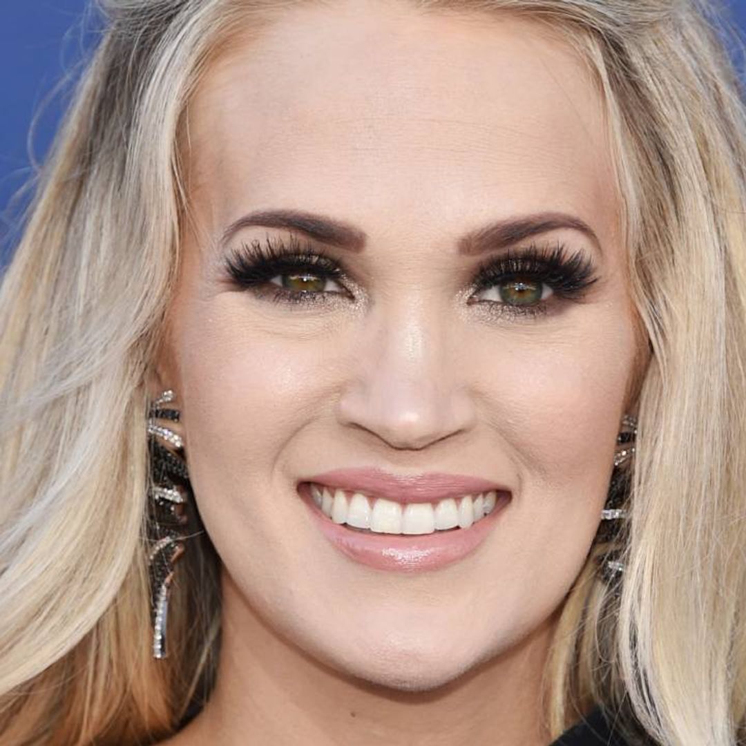 Carrie Underwood rocks statement gothic gown with a twist during AMAs performance