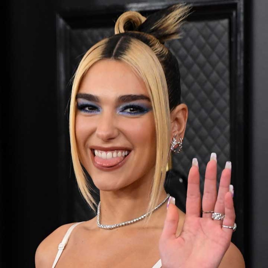 Dua Lipa braves travel restrictions and stuns in statement jacket in Mexico