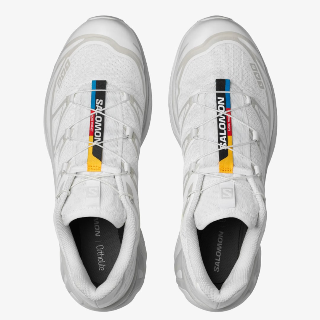 White Salomon XT-6 Unisex Sportstyle Shoes photographed next to each other on a white background
