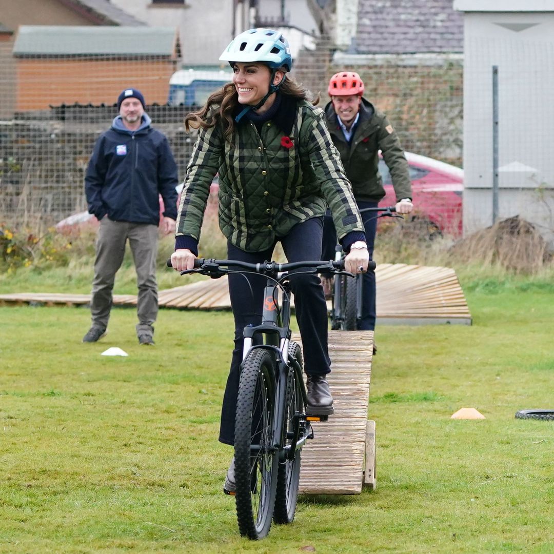 The Prince and Princess of Wales jump on mountain bikes in Scotland