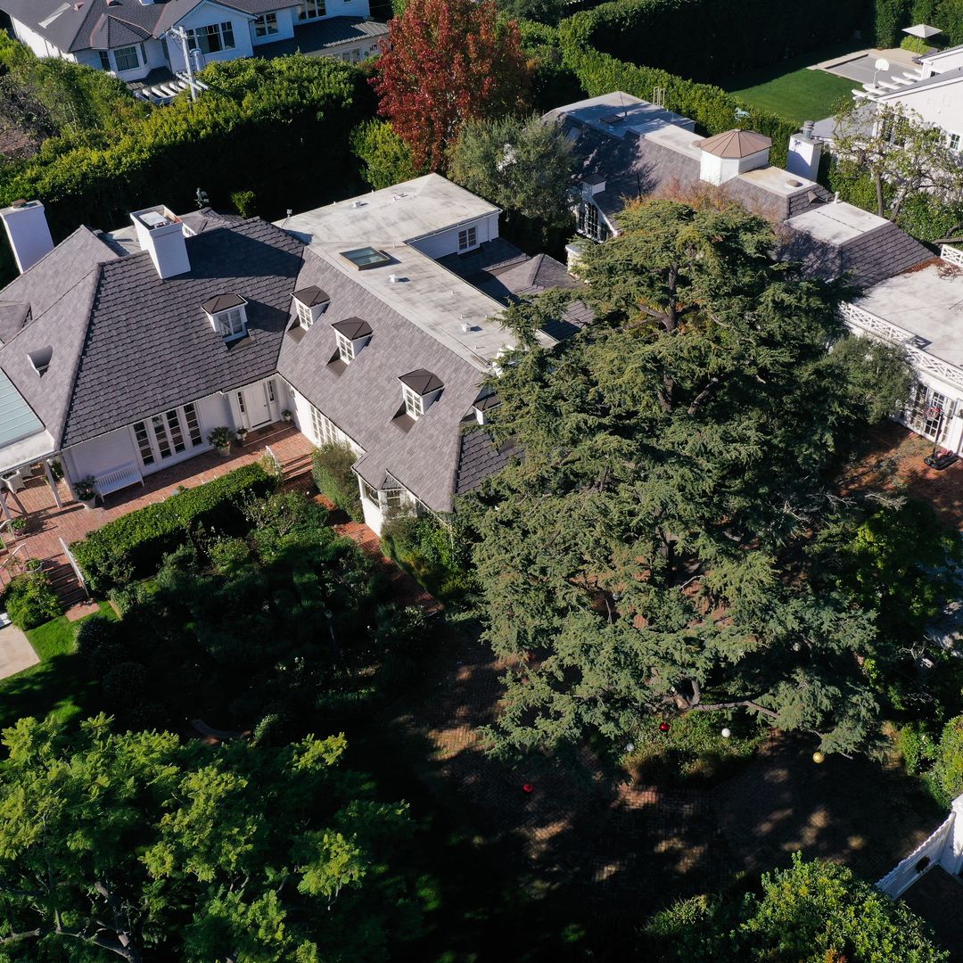 An aerial image shows the home of US actor and director Rob Reiner following their death in the Brentwood neighborhood of Los Angeles, California on December 15, 2025 after Reiner and his wife Michele Reiner were found dead at their southern California mansion. Reiner's son was charged with murder, police said on December 15, after his father and mother were found dead the previous day in their Los Angeles home.