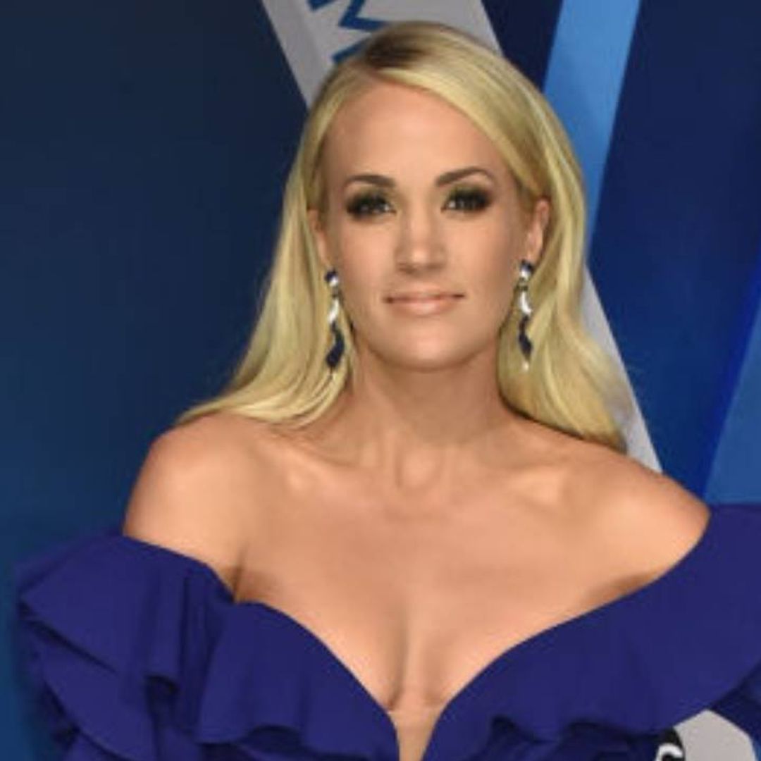 Carrie Underwood showcases toned legs in dazzling mini dress during extra  special concert
