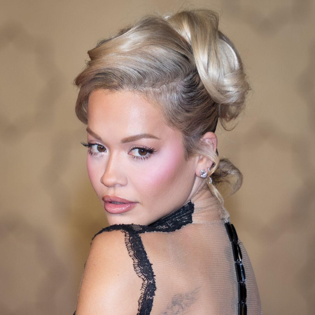 Rita Ora opts for yet another plunging neckline in gothic backless gown