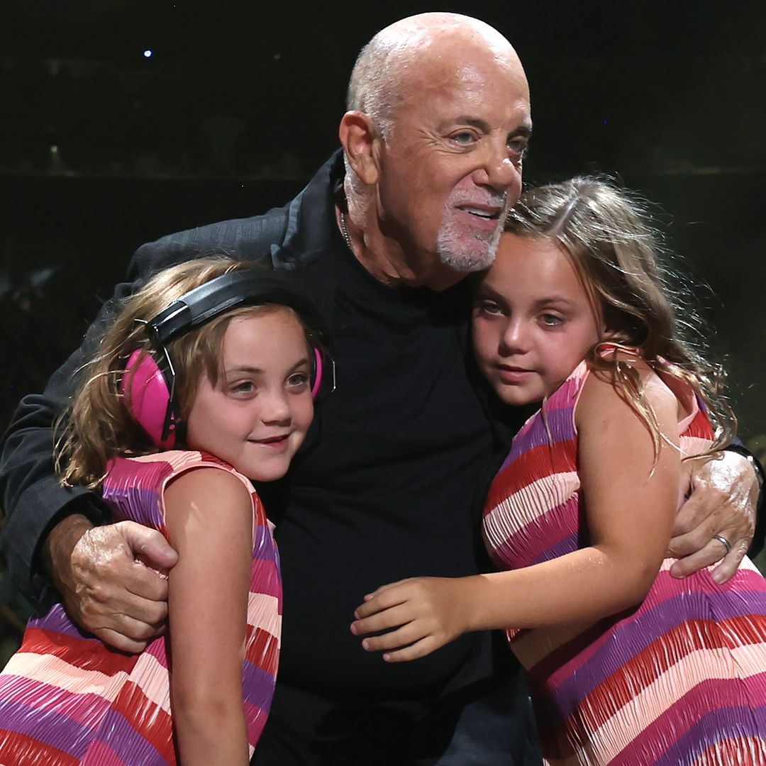  Billy Joel's young daughters surprise crowd as they perform on stage with him 