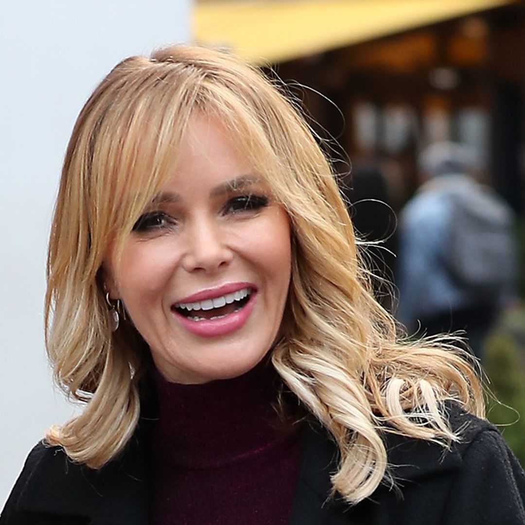 Amanda Holden poses up a storm in skinny leather-look leggings