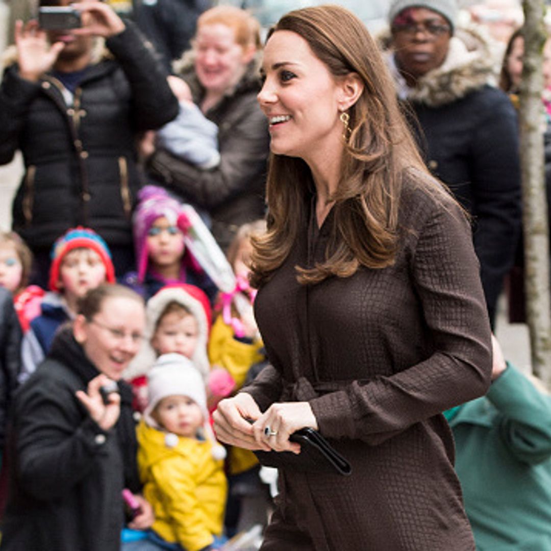 A glowing Kate Middleton meets foster caregivers and children