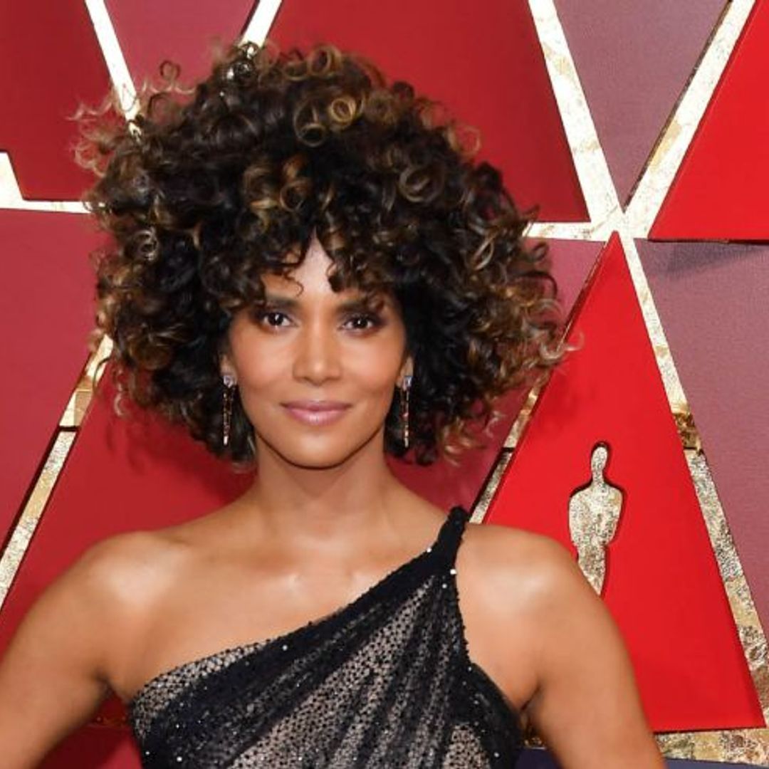 Halle Berry celebrates her natural curls on the Oscars red carpet