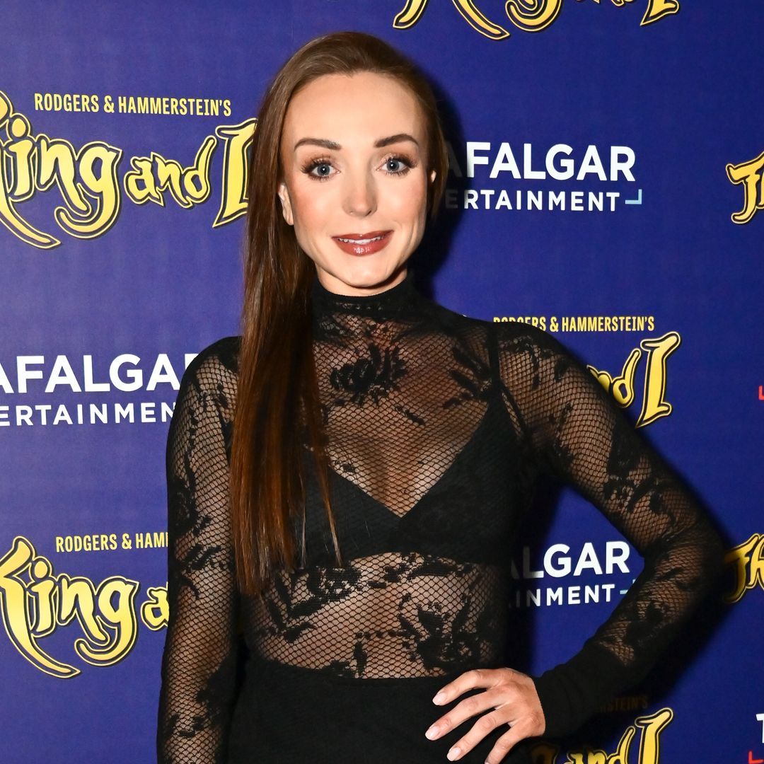 Helen George is a total vixen in sheer lace top and power suit