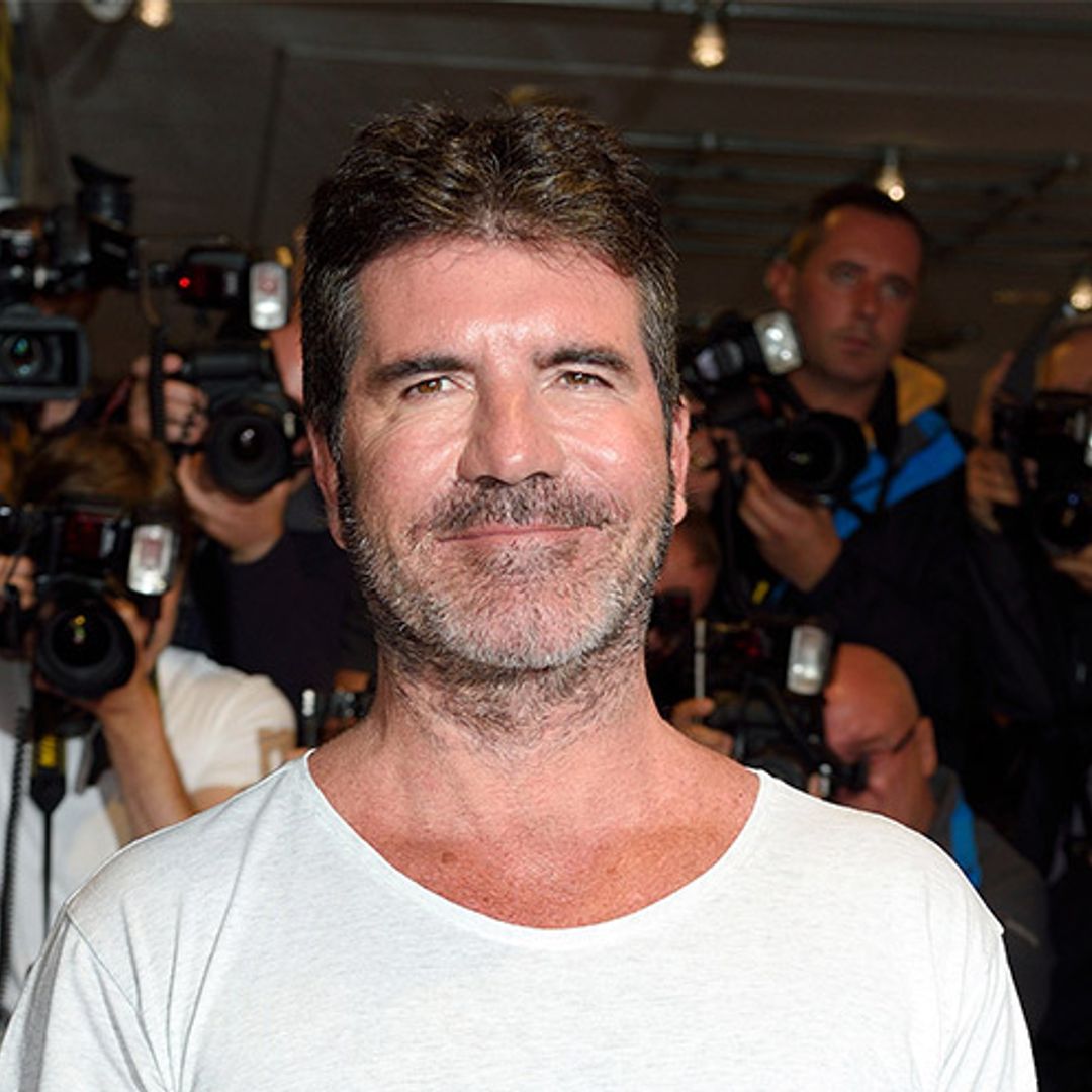 Simon Cowell poses for very rare family photographs as he accepts star on the Hollywood Walk of Fame