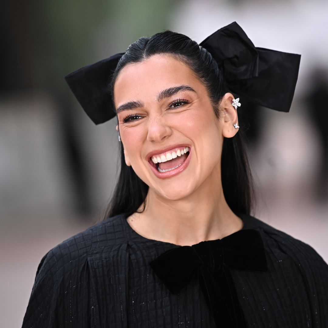 Dua Lipa's backless lace slip dress has us swooning for summer style