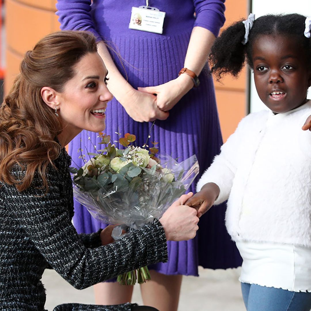 Kate Middleton shows off her arty side as she joins children in London hospital - best photos