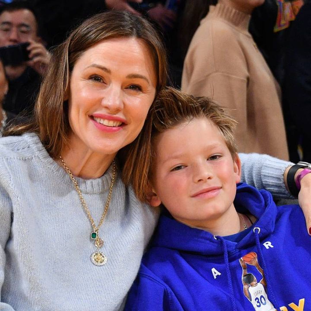 Jennifer Garner dotes on lookalike son Samuel during rare outing - and he's so grown up