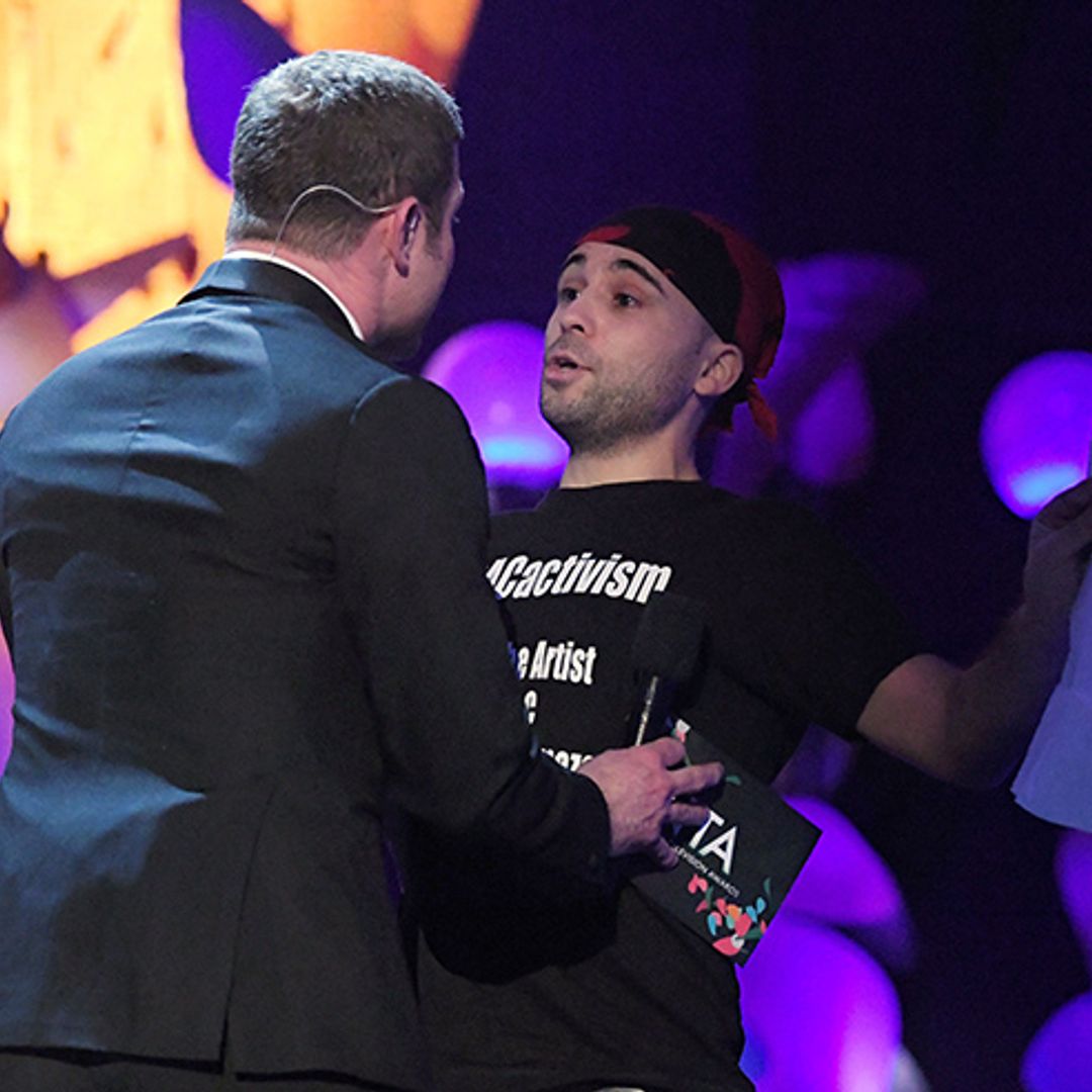 Dermot O'Leary confronted by stage invader at National Television Awards