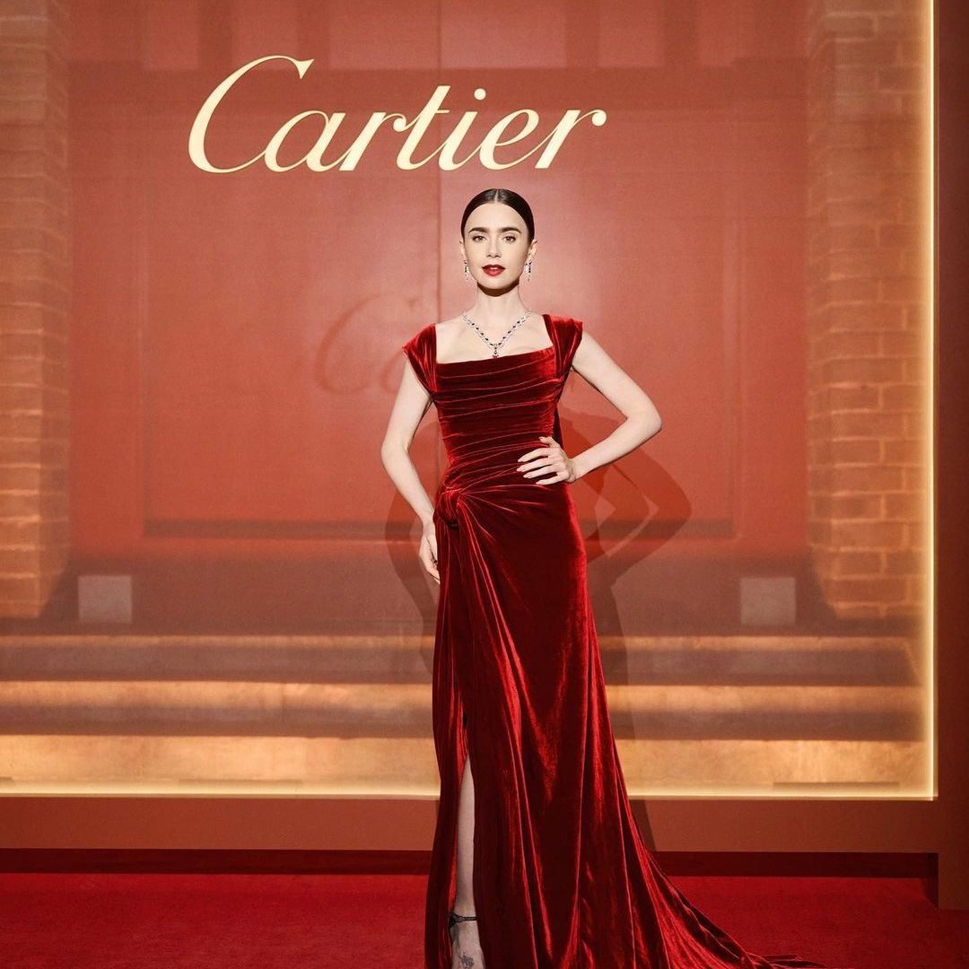 Lily Collins oozes Old Hollywood glamour in striking red velvet gown