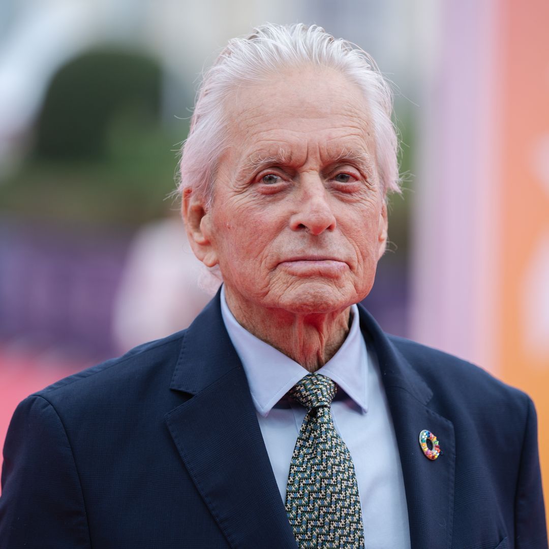 Michael Douglas caught off guard by unexpected interruption to his suave moment on camera — watch