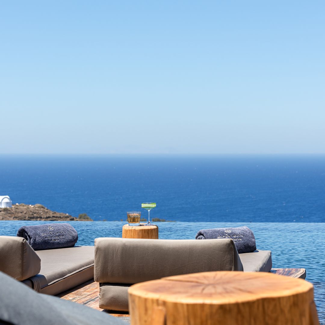 I retreated from the Santorini crowds at the island's most luxe hotel - with a swim-up bar