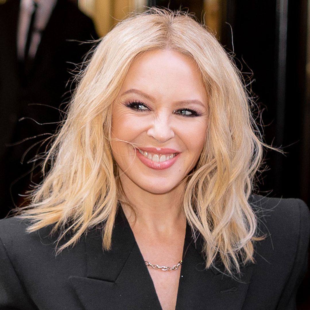 Kylie Minogue is a goddess in decadant thigh-high boots