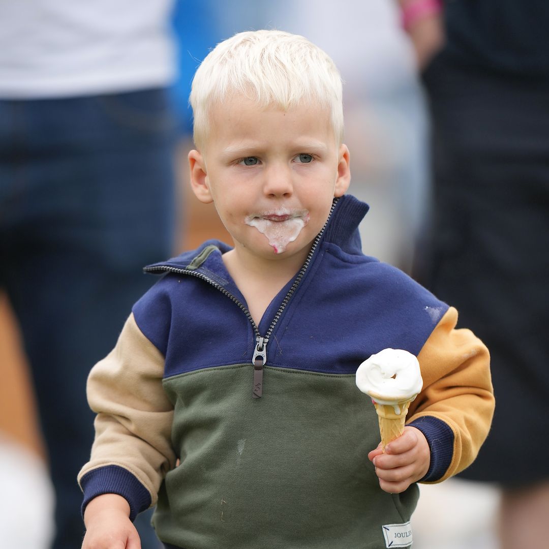 Lucas Tindall is a 'wild' child on day out with dad Mike Tindall to support mum Zara