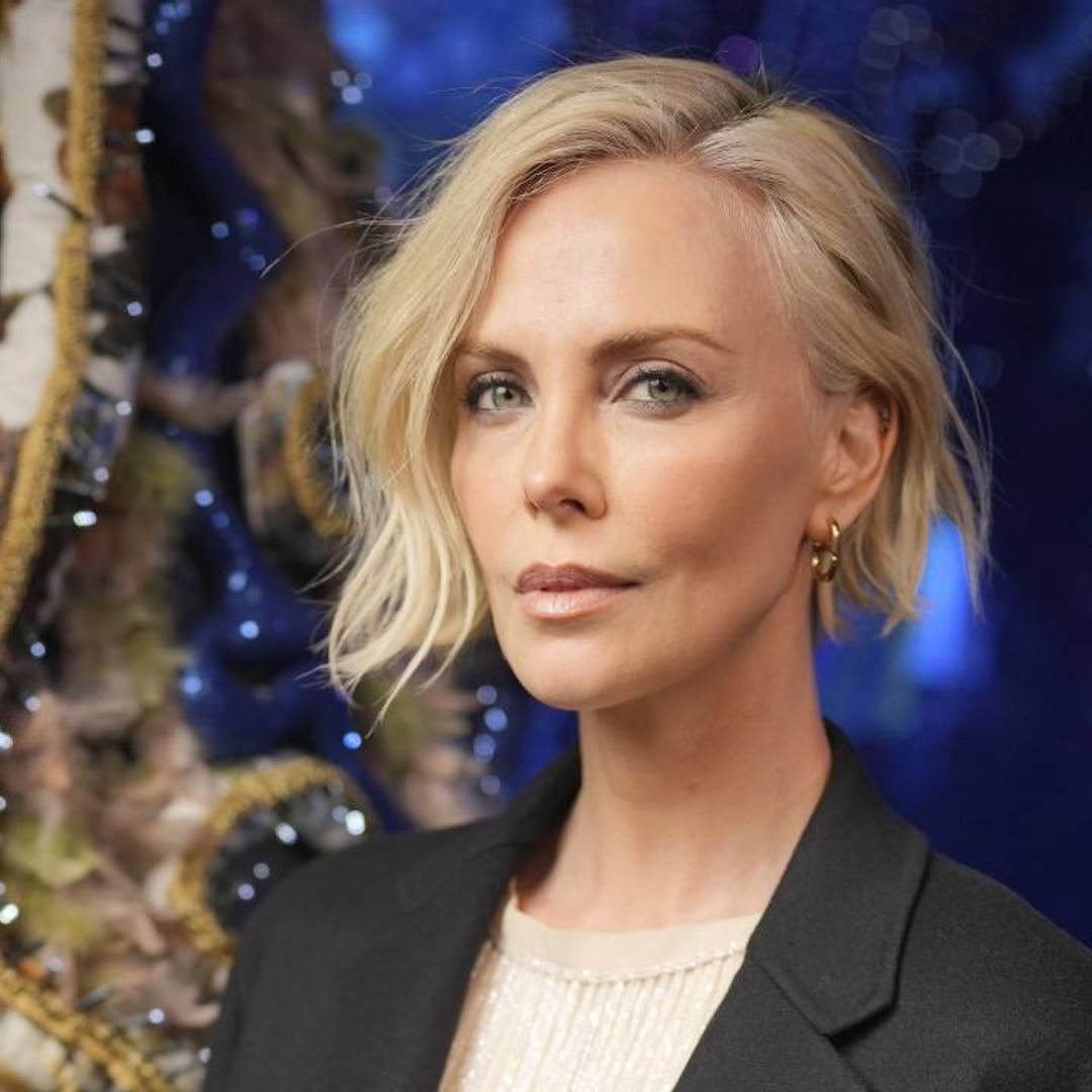 Charlize Theron looks chic as ever after hair transformation as she attends the Dior fashion show in Paris
