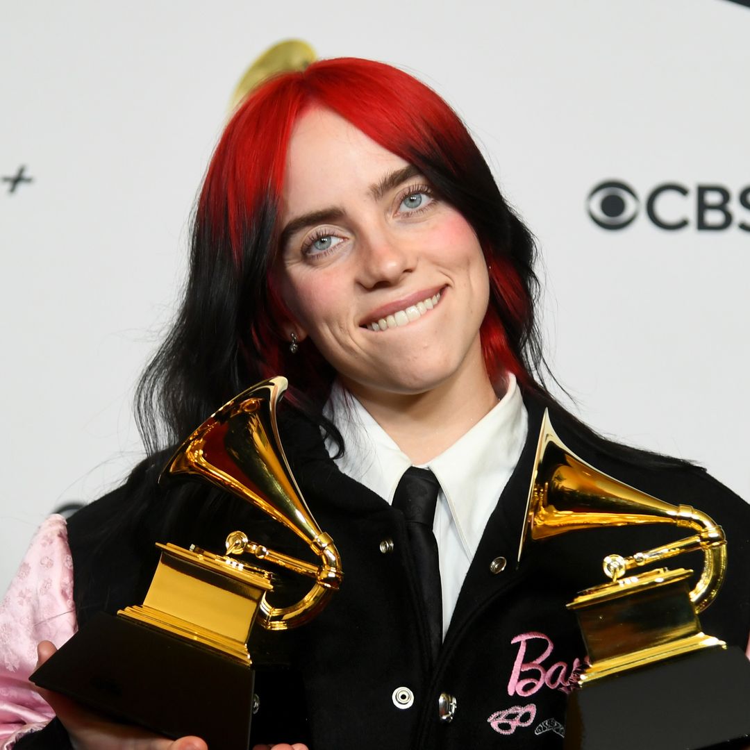 Billie Eilish strips down to a deeply plunging waistcoat with matching pants for Grammys afterparty