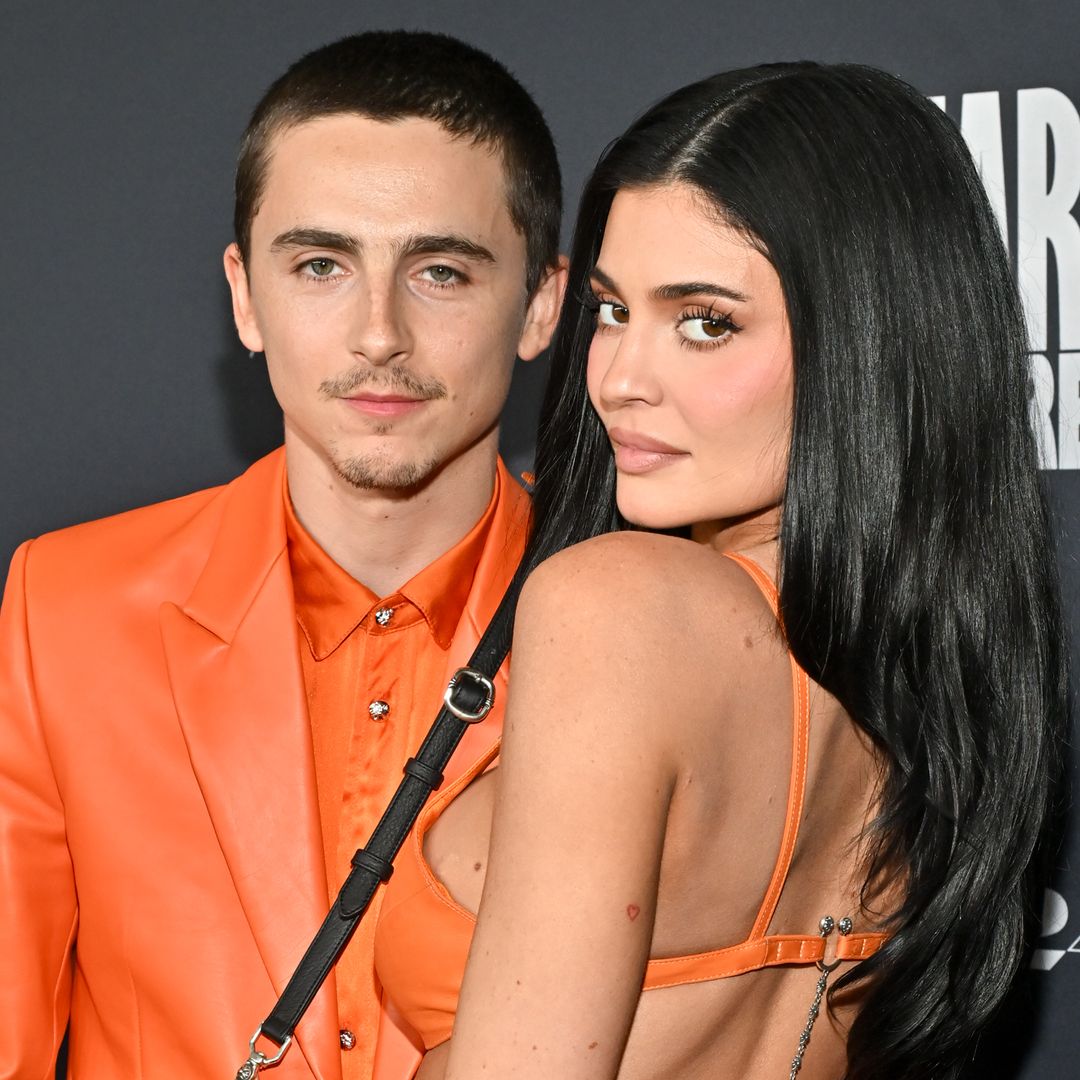 Kylie Jenner and Timothée Chalamet twin in orange leather for PDA date night