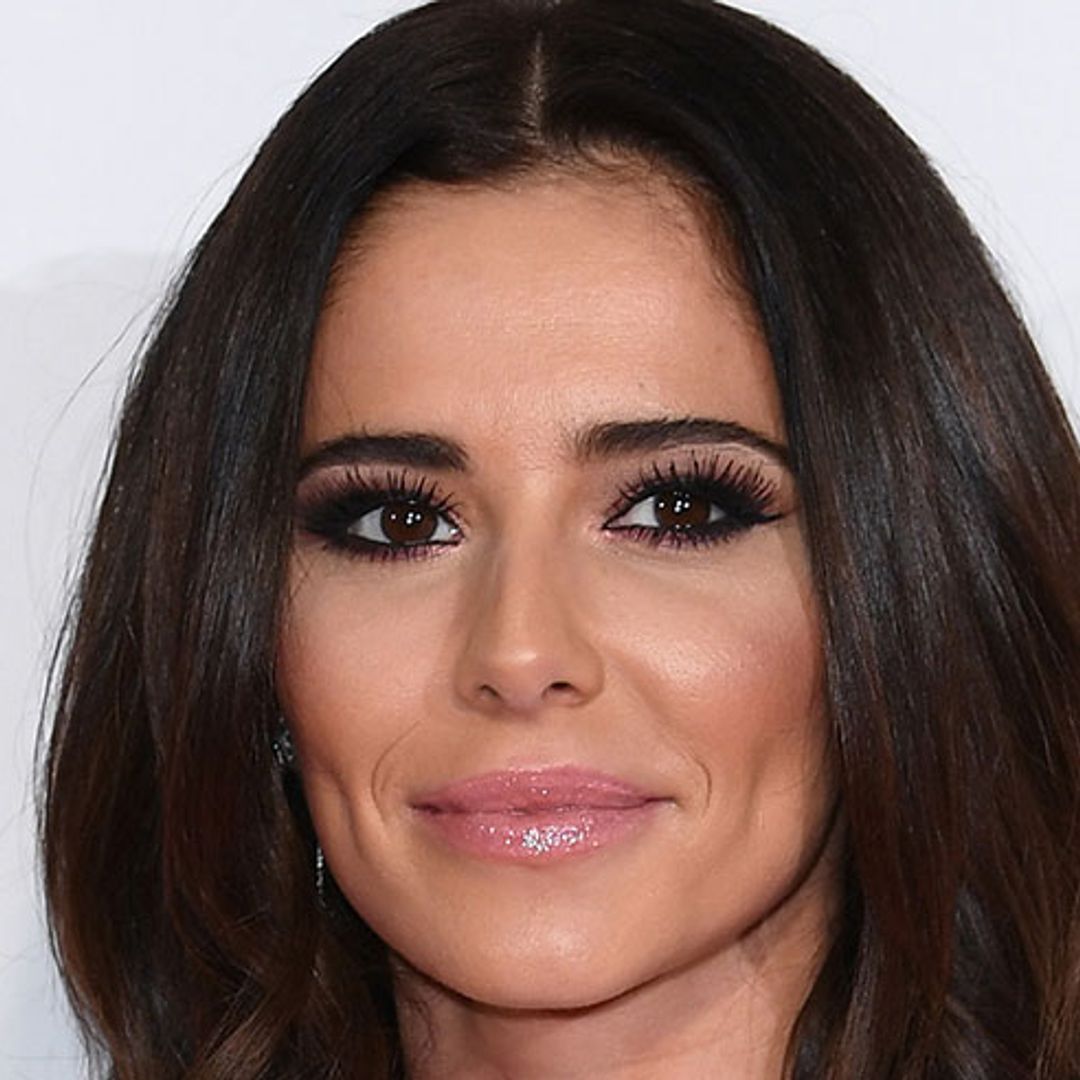 Cheryl rocks an angelic white dress for the Jingle Bell Ball - and wait until you see the sleeves
