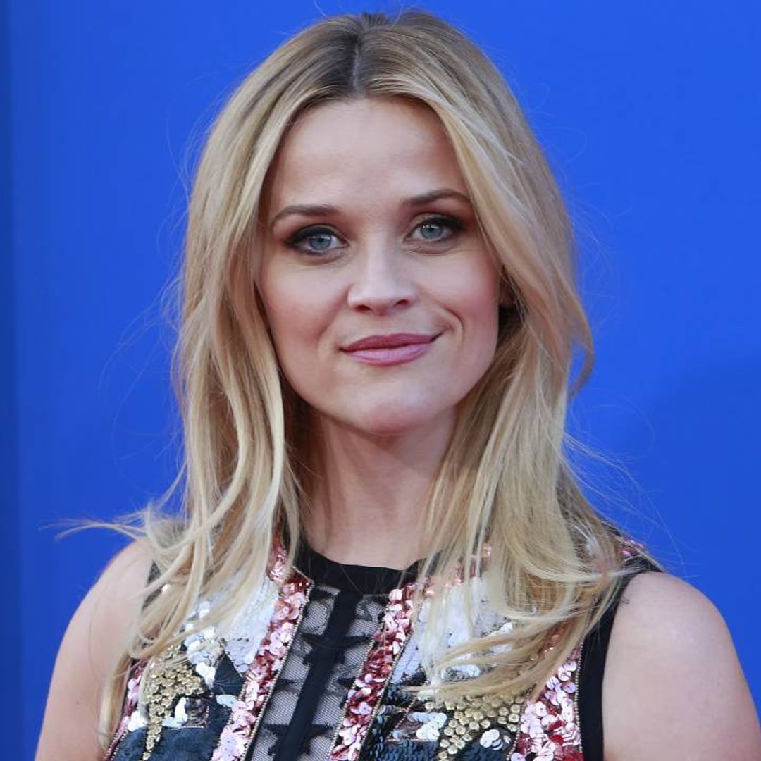 Reese Witherspoon thrills fans in a hot pink dress we want too