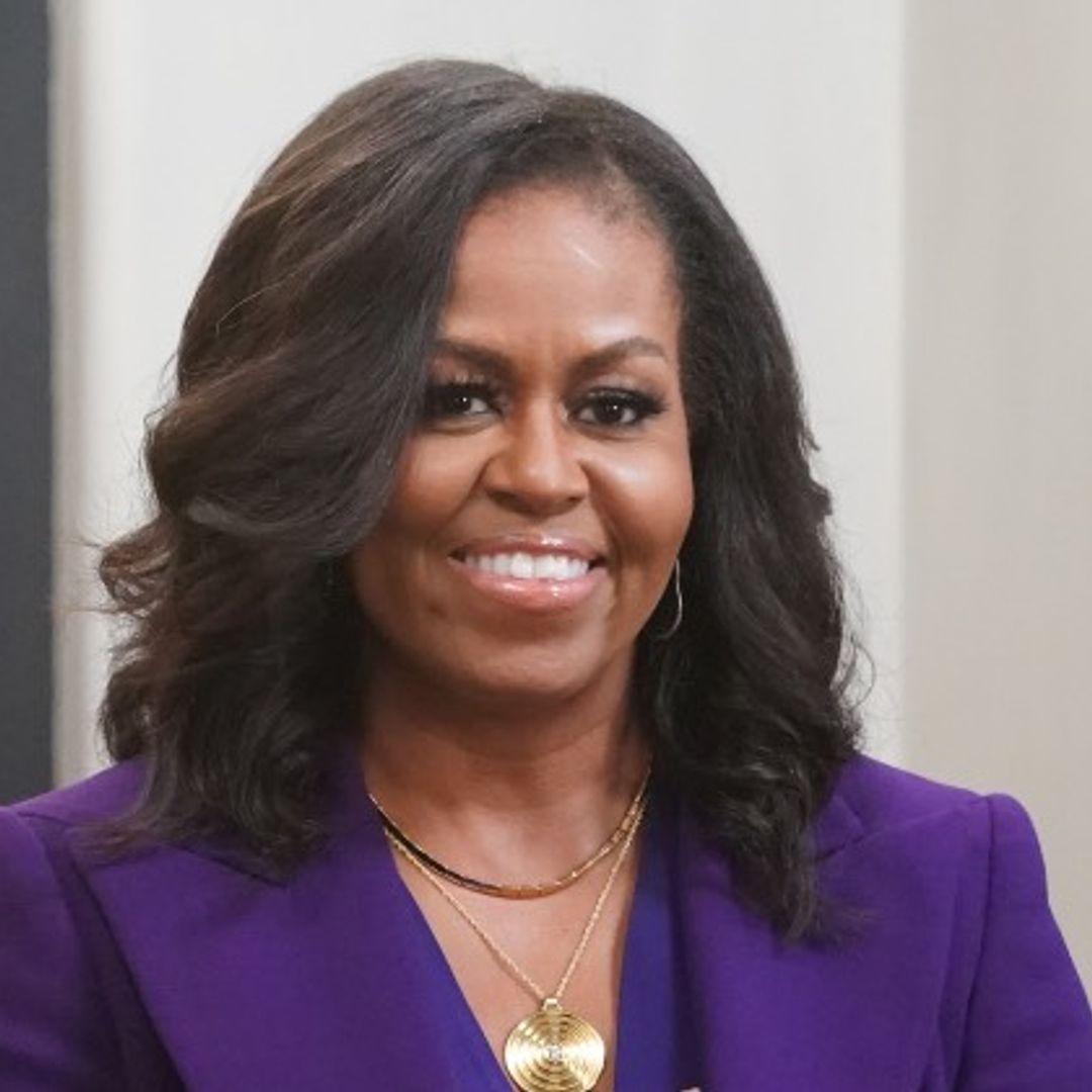 Michelle Obama is her rarely-seen lookalike relative's twin in celebratory throwback photo