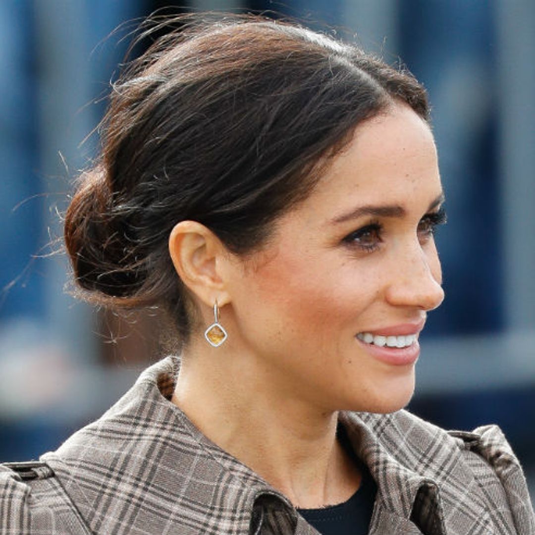 Meghan Markle steps out in £35 ASOS maternity dress as she arrives in New Zealand