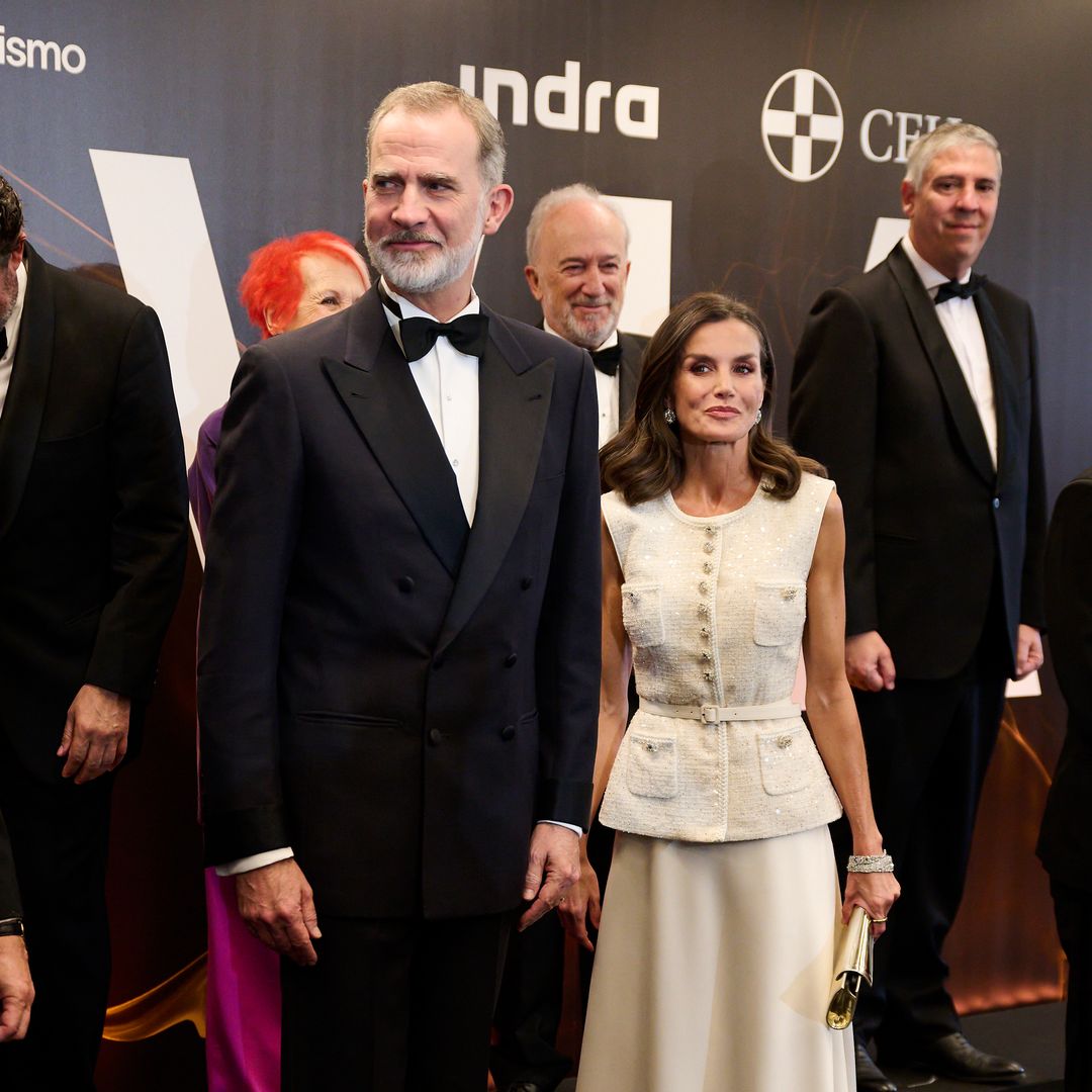 Queen Letizia is an absolute vision in white as she steps out alongside King Felipe