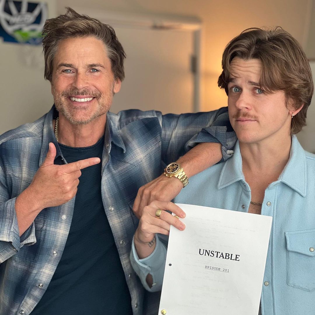 Rob Lowe and his son John Owen Lowe pose with a script for their Netflix show "Unstable," shared on Instagram