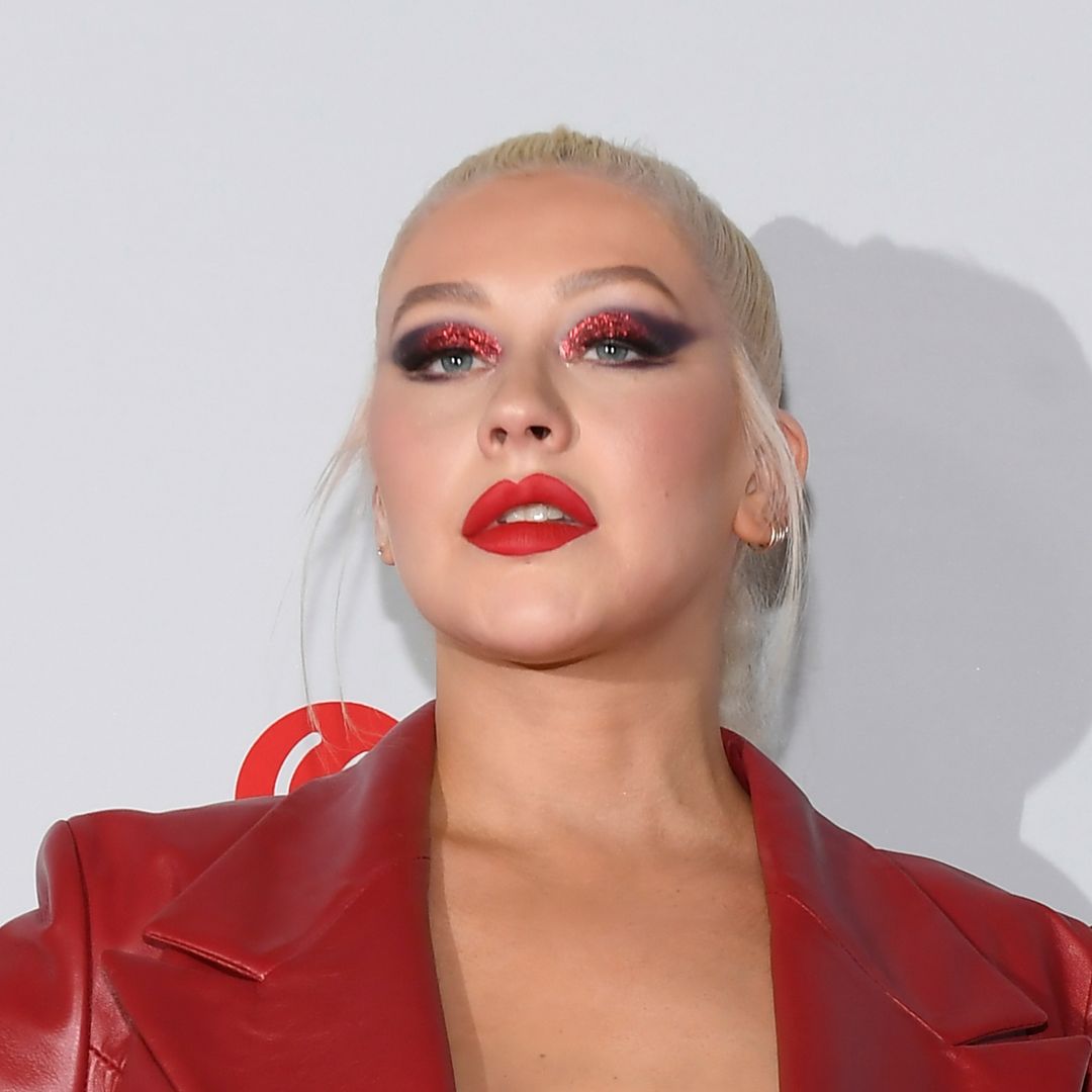 Christina Aguilera steps out in burgundy hotpants ahead of 45th birthday