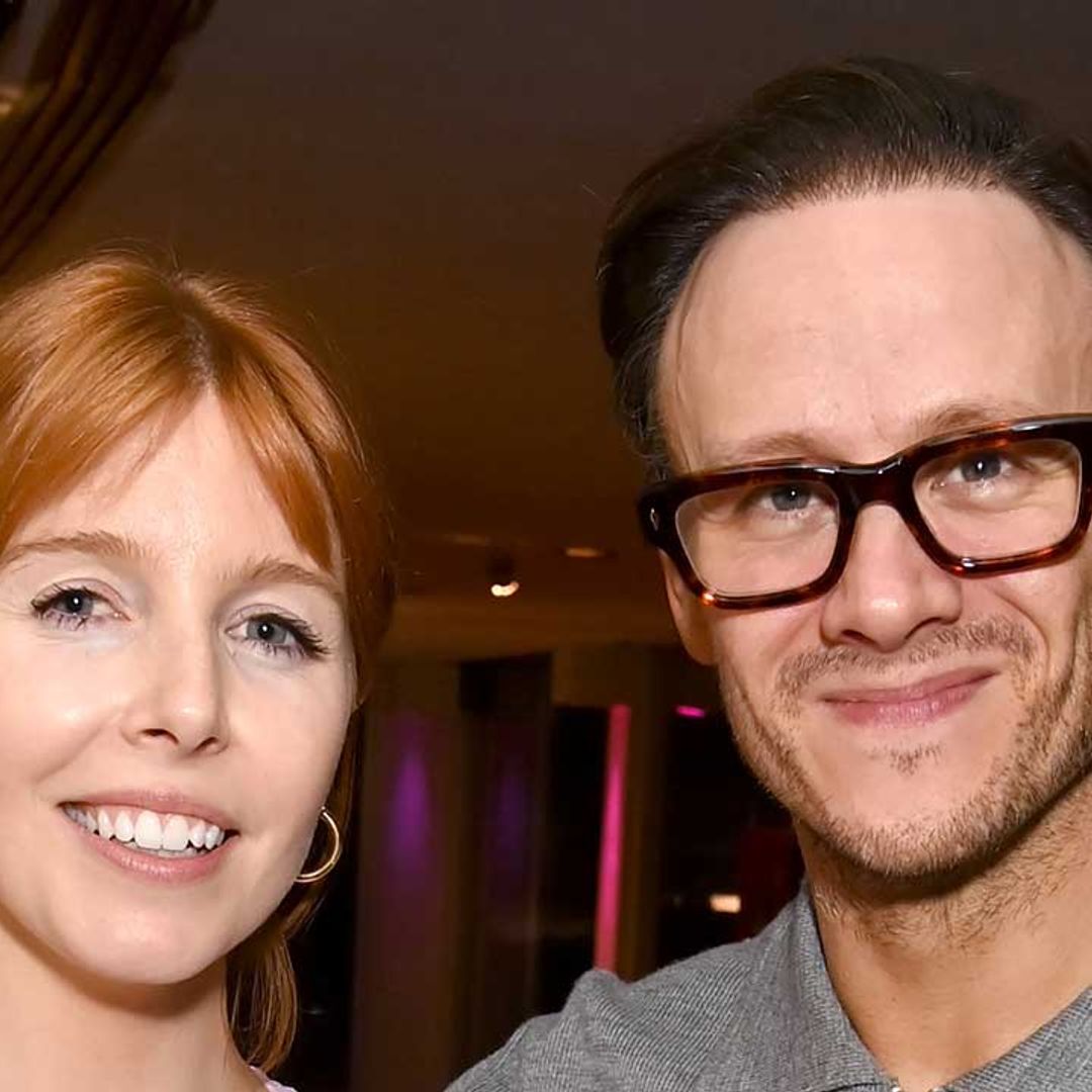 Stacey Dooley cuddles baby Minnie whilst apart from Kevin Clifton on her birthday