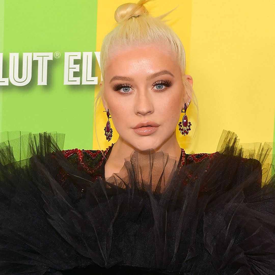 Christina Aguilera poses up a storm roadside – and she's not alone