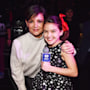 Katie Holmes' lookalike daughter Suri, 17, almost towers over her mother in rare NYC outing