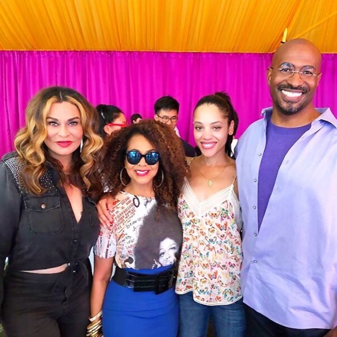 Bianca smiling at a party with Beyonce's mom and her step-mom Tina Lawson and two others