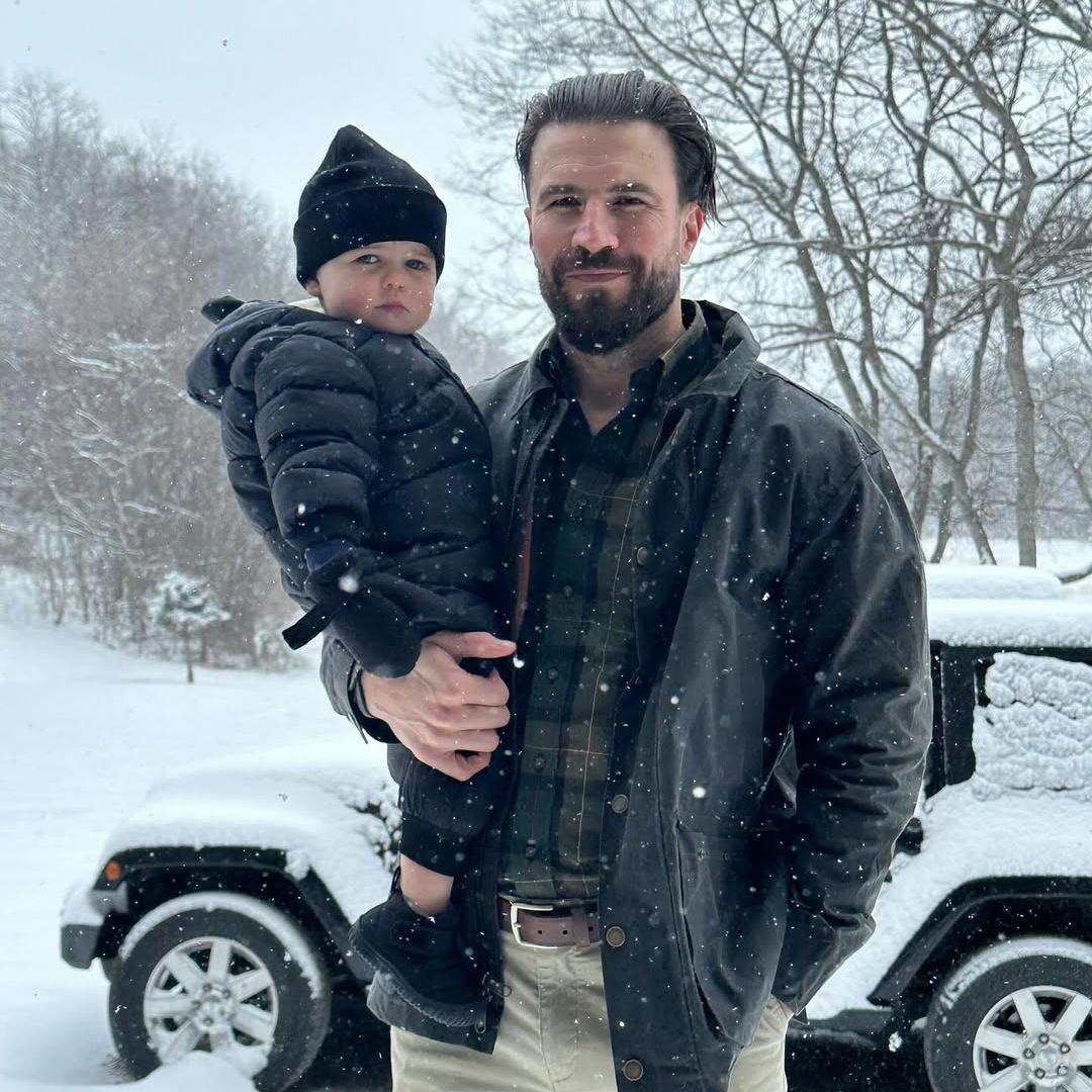 Sam Hunt holds his son Lowry Lee in his arms on a snow day, shared on Instagram