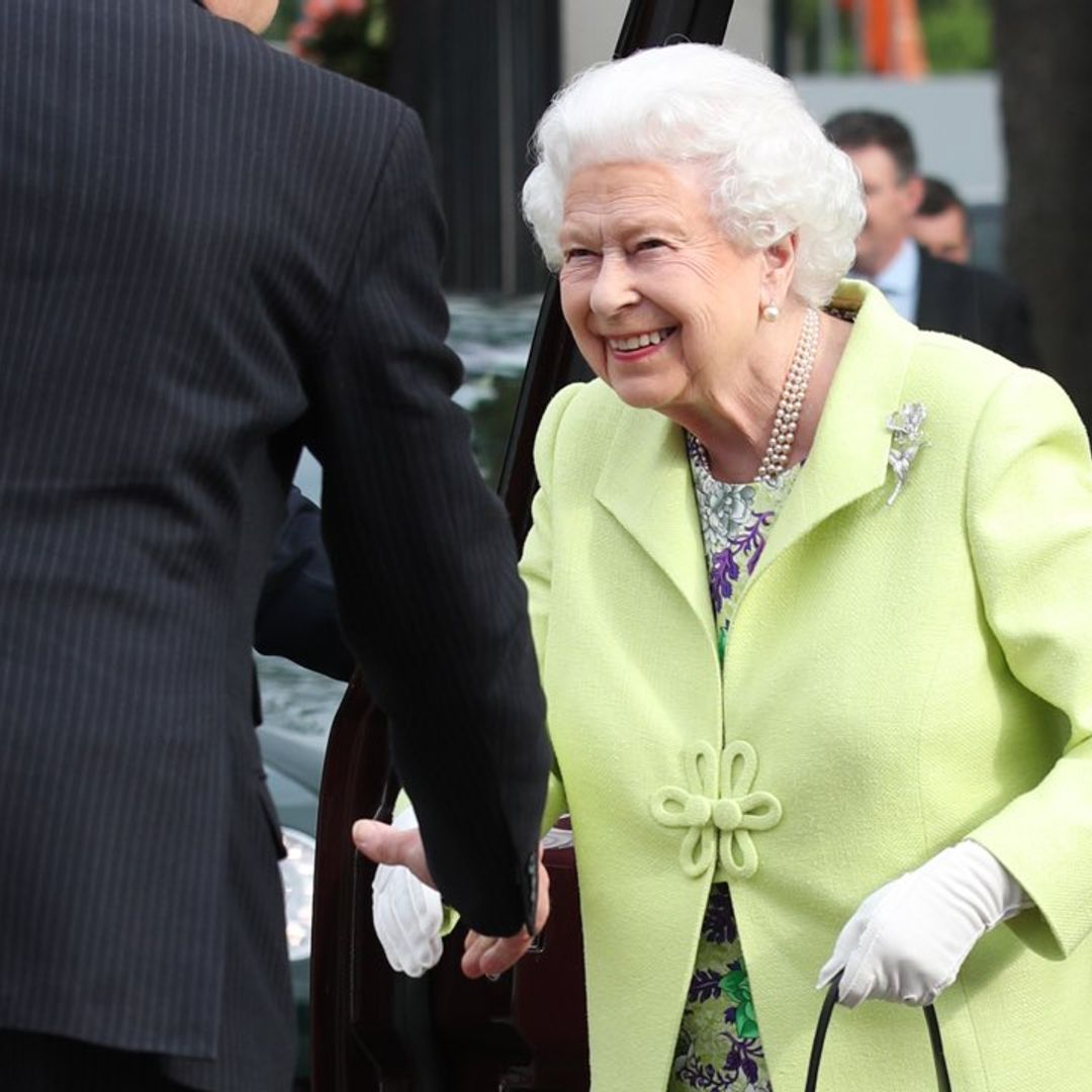 The Queen beams in lime green at Chelsea Flower Show with royal family