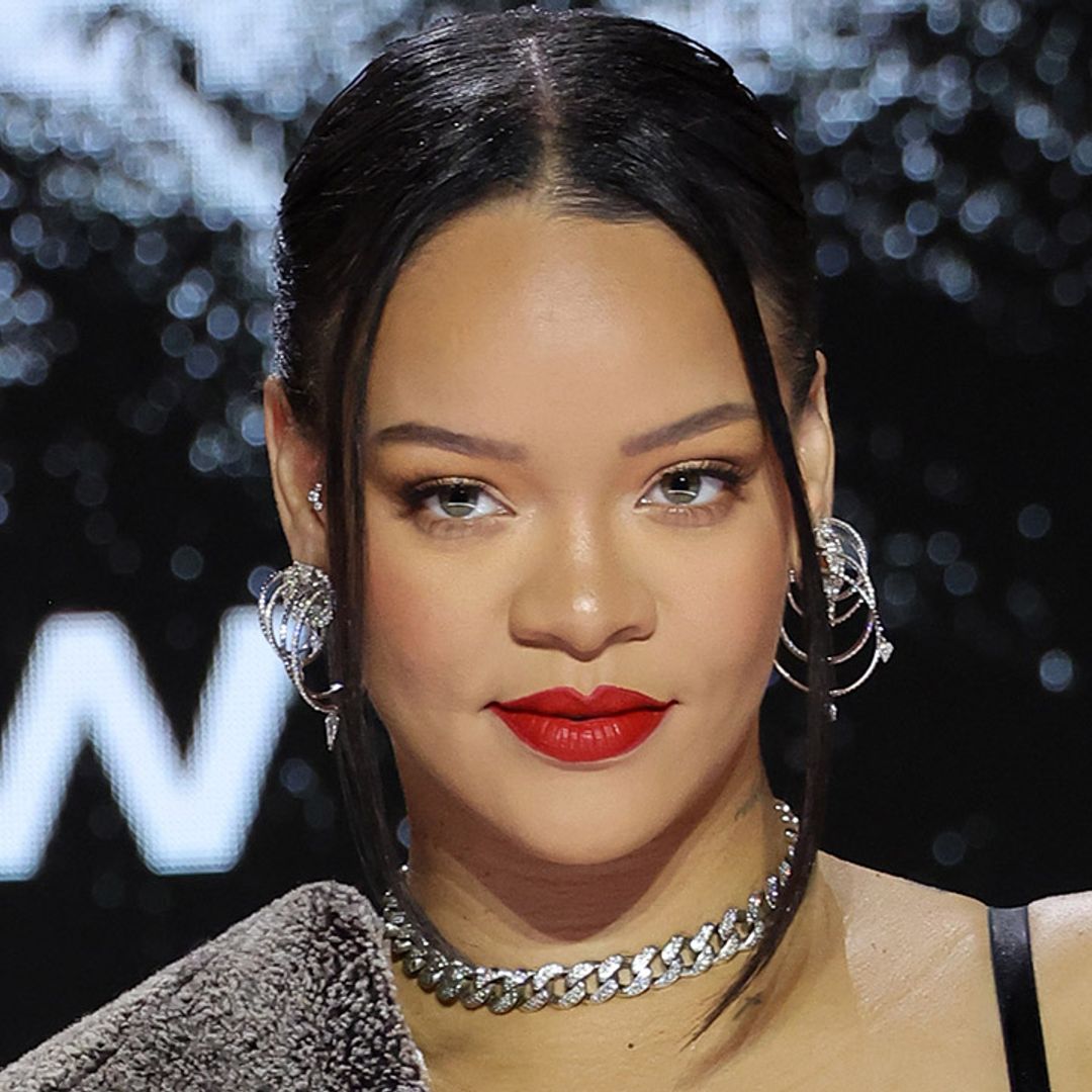 Rihanna glows in croc-effect skirt and gothic bustier