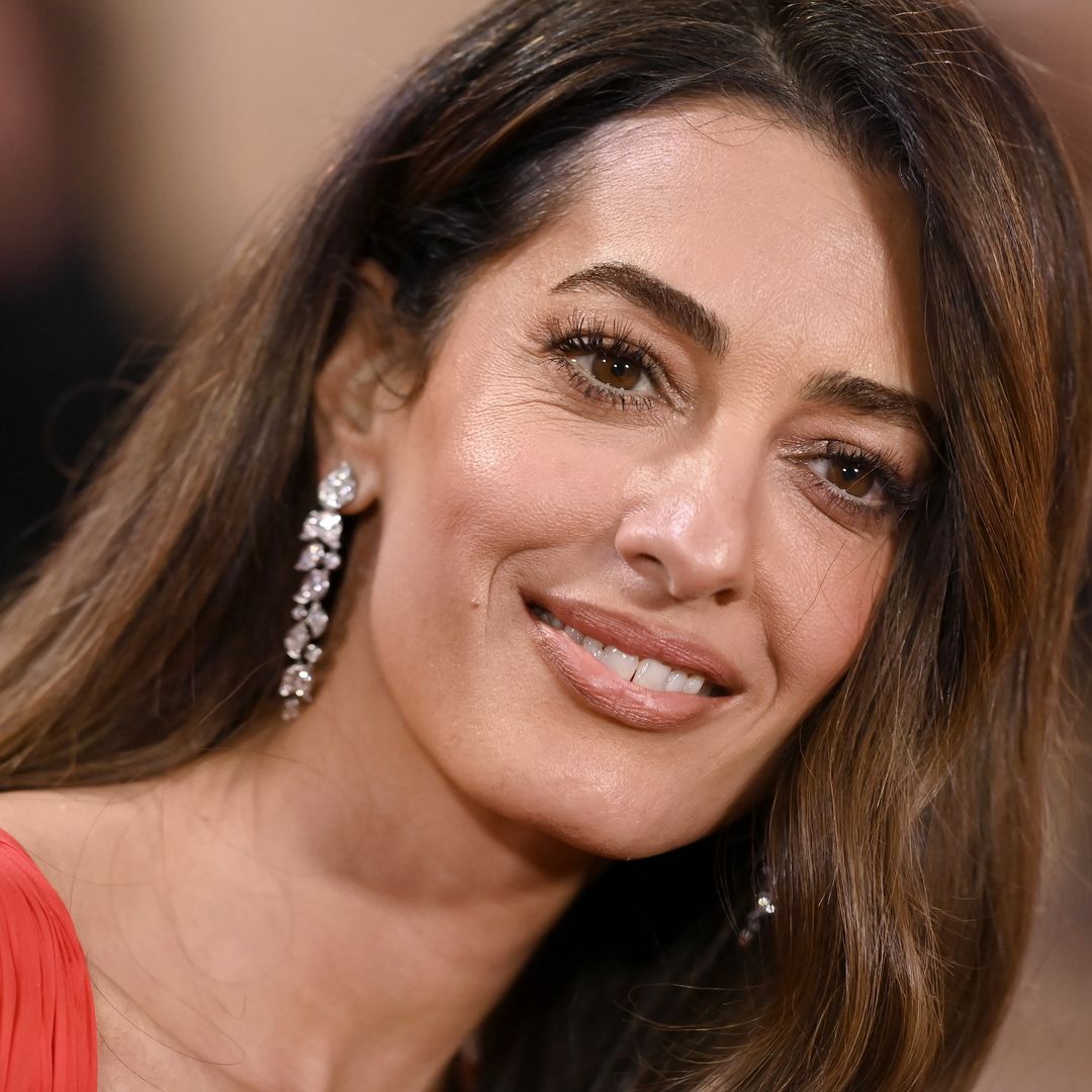 Amal Clooney is the ultimate mob wife in ankle-grazing fur coat