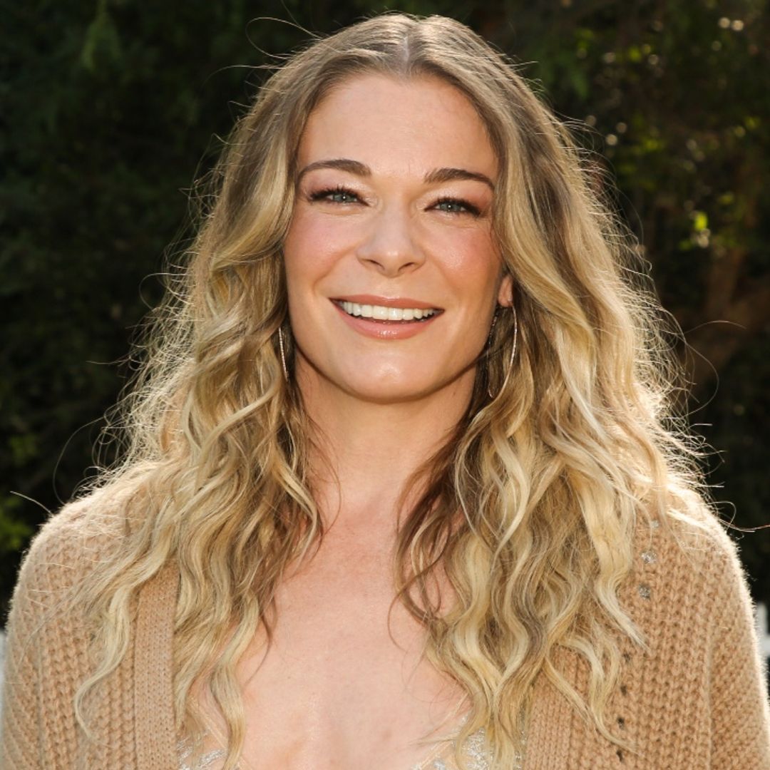 LeAnn Rimes looks unrecognizable in teenage throwback as she accepts first ever Grammy
