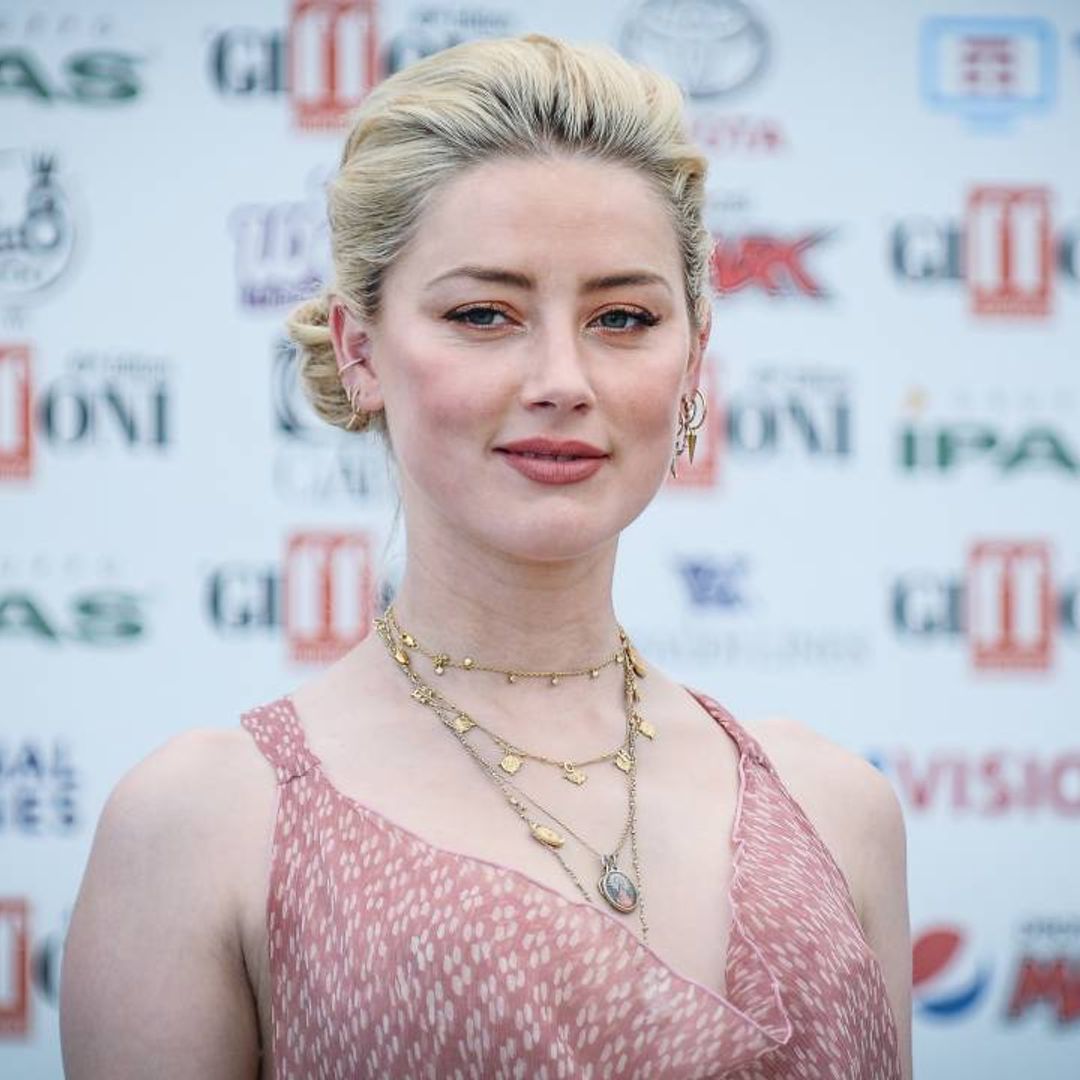 Amber Heard's adorable daughter steals the show in first video since surprise baby announcement