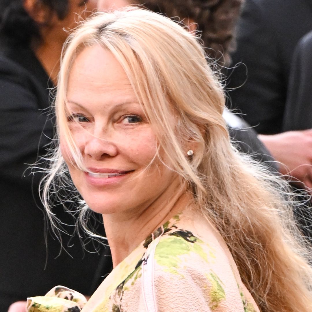 Radiant Pamela Anderson goes makeup-free wearing Victoria Beckham dress in Paris
