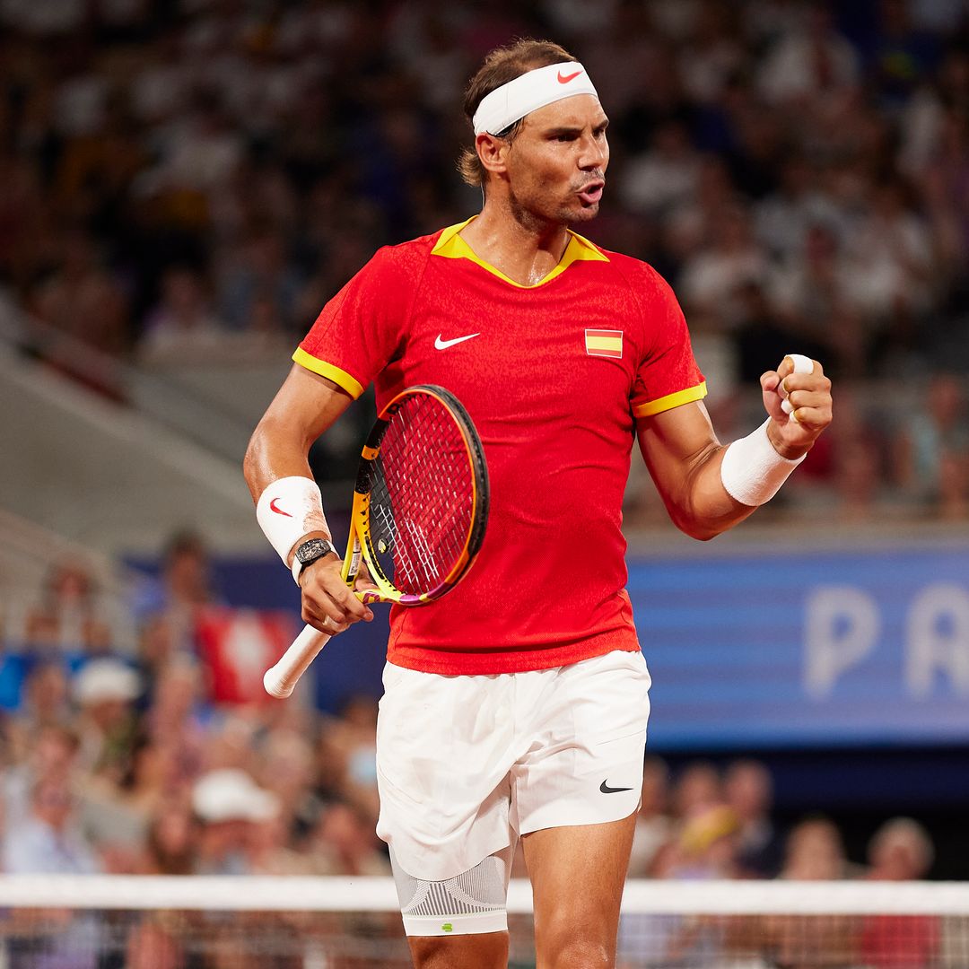 Rafael Nadal of Team Spain celebrates with partner Carlos Alcaraz of Team Spain against Austin Krajicek of Team United States and Rajeev Ram of Team United States during the Men's Doubles Quarter-final match on day five of the Olympic Games Paris 2024 at Roland Garros on July 31, 2024 in Paris, France.