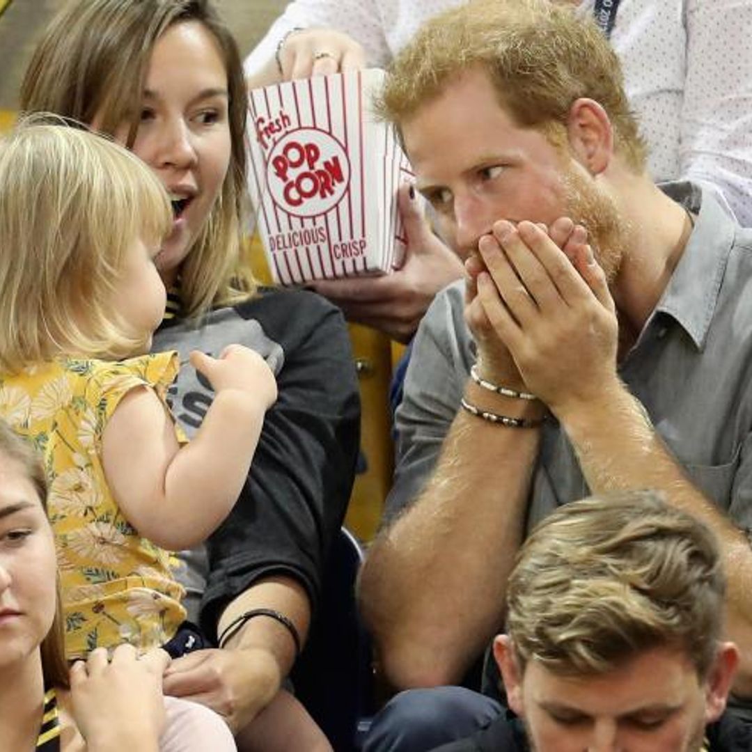 Prince Harry shares popcorn with little girl - see the cute photos!