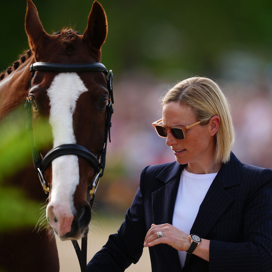 Zara Tindall is a sporty vision in white skinny jeans and trainers