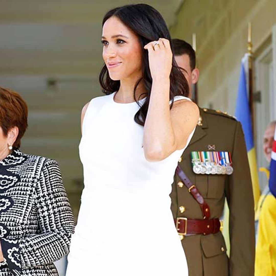 Duchess Meghan shows hint of baby bump on the first day of the royal tour of Australia